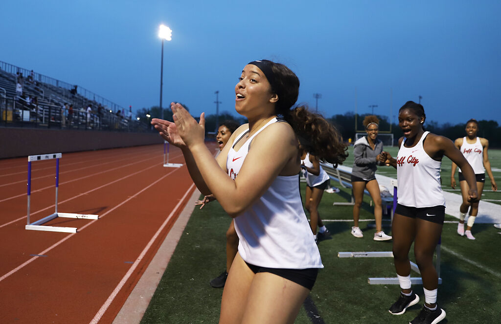 Zaliah Dunbar cheers for her teammate